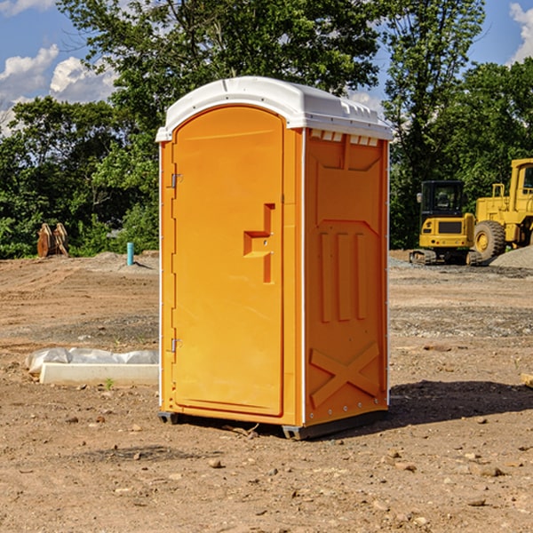 how often are the portable restrooms cleaned and serviced during a rental period in Sweeny